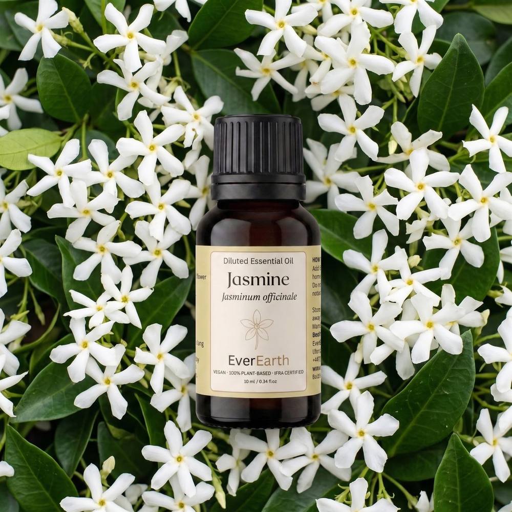 EverEarth Jasmine essential oil 10ml bottle on a bed of jasmine flowers