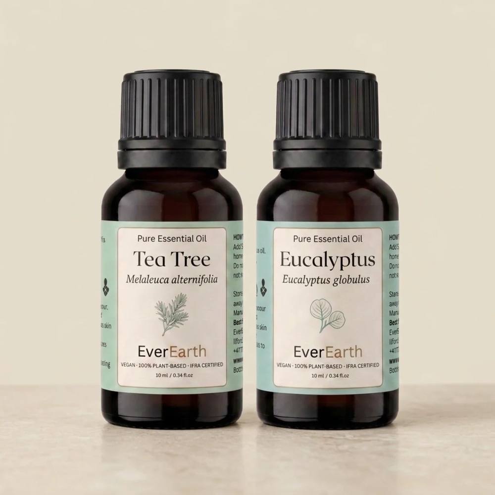 EverEarth Fresh Home Duo, Tea Tree and Eucalyptus 10ml amber glass bottles on cream