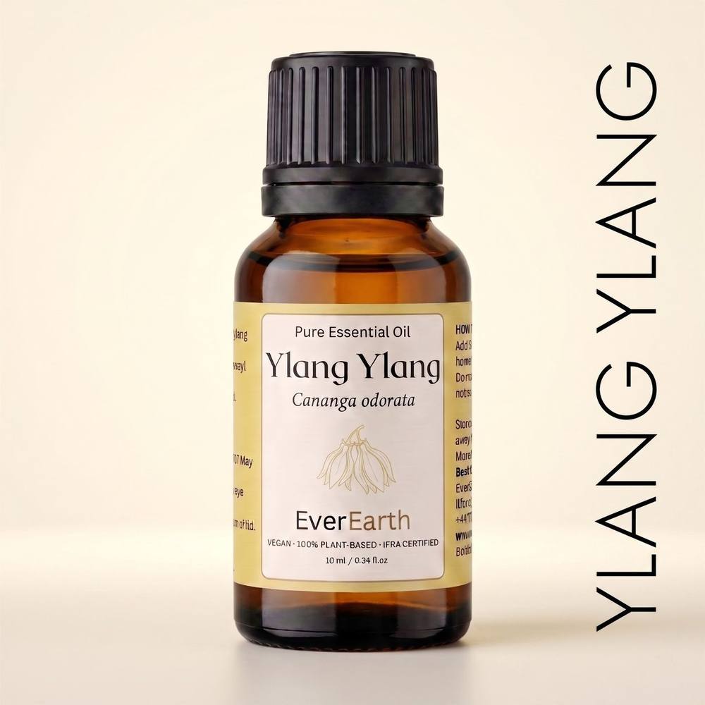 EverEarth Ylang Ylang essential oil, 10ml amber glass bottle on cream backdrop