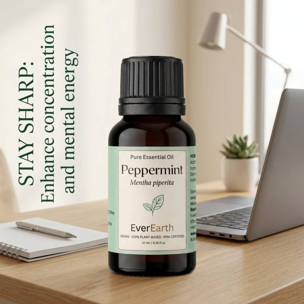 EverEarth Peppermint essential oil on a desk beside a laptop, stay sharp for focus