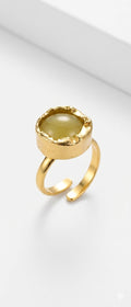 Title: House of Rivit Irregular Gold Cuff Ring with Yellow-Green Stone